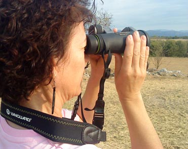 Florinda testing out the Vanguard ED 10 x 42 in the field