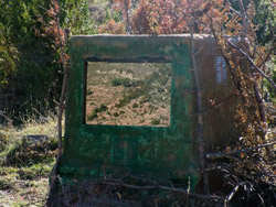 Our first hide, an inverted heavy dusty plastic municipal bin, just for a single person